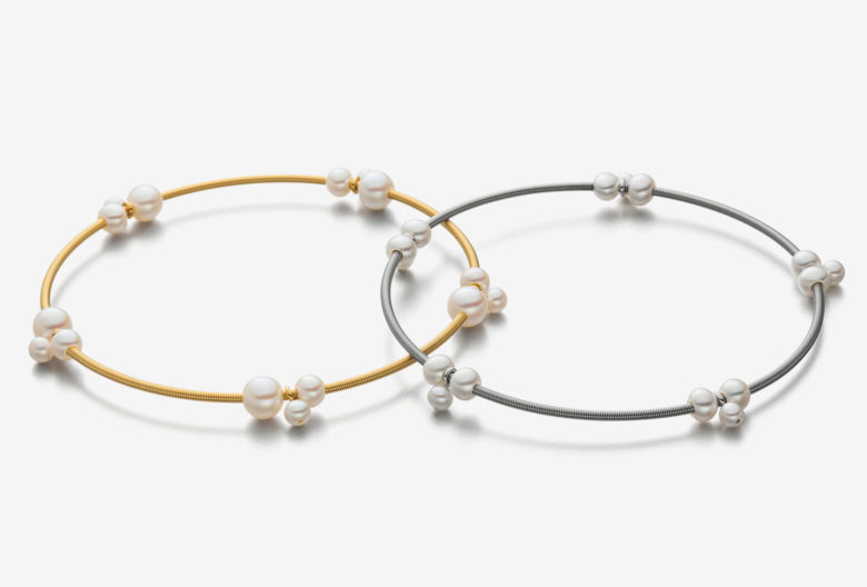 Bangles <em>mini-trio</em>. Stainless steel, partly gold plated, freshwater pearls.
