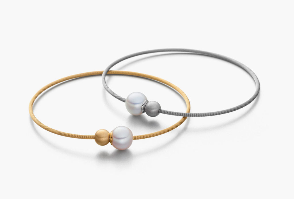 Bangles <em>Two</em>. Freshwater pearls, stainless steel, partly gold-plated, magnet.