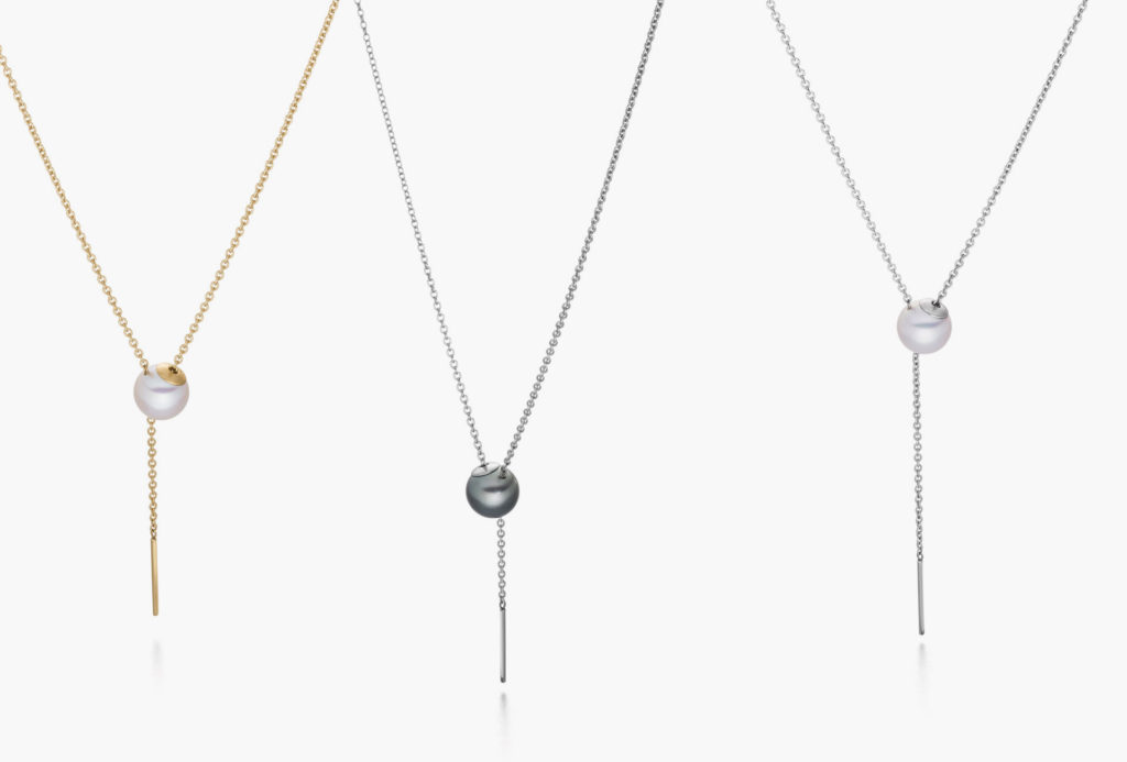 Necklaces <em>Lift</em>. Freshwater and Tahitian pearl, stainless steel, partly gold plated.