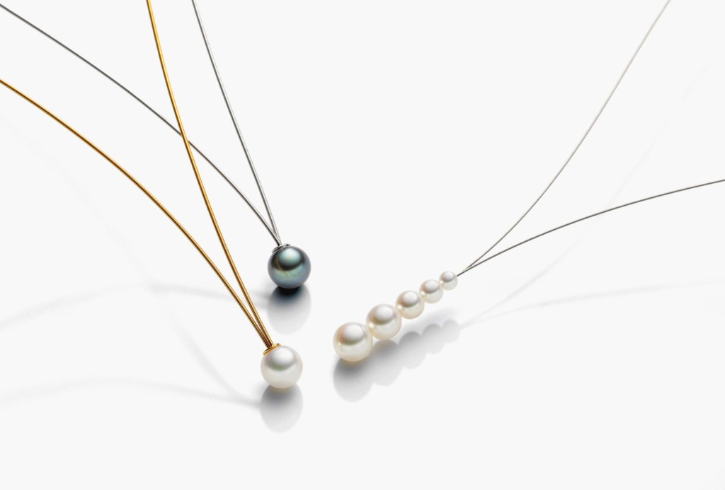 <em>Viola</em> necklaces. Stainless steel, partly gold-plated, freshwater pearls, Tahitian pearls.