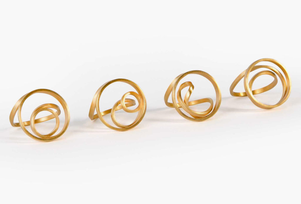 Rings <em>Dreh dich… im Kreis</em> (turn around in a circle). 750 yellow gold, available 750 white gold, 925 silver, gold-platted silver. 199–899 €. reddot Award. German Design Award.