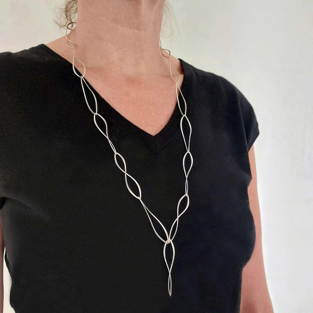 <em>Waves</em> necklace. 925 sterling silver, forged.