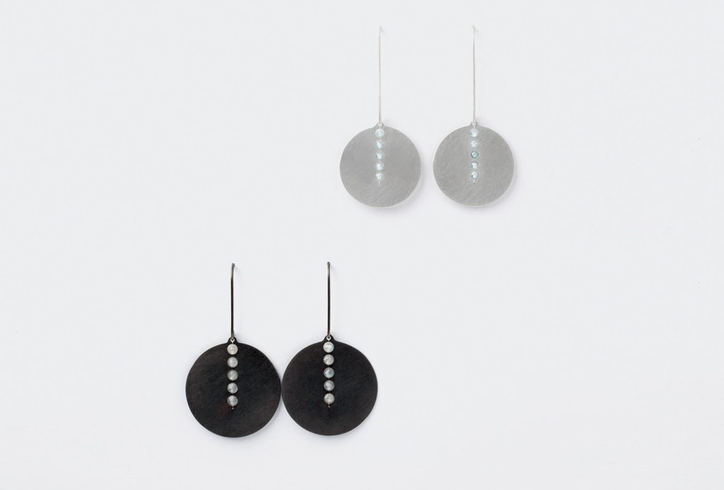 <em>bubbles</em> earrings, 2020. Silver 925, oxidized, rhodium-plated, labradorite, zirconia. Photo Mirei Takeuchi.
