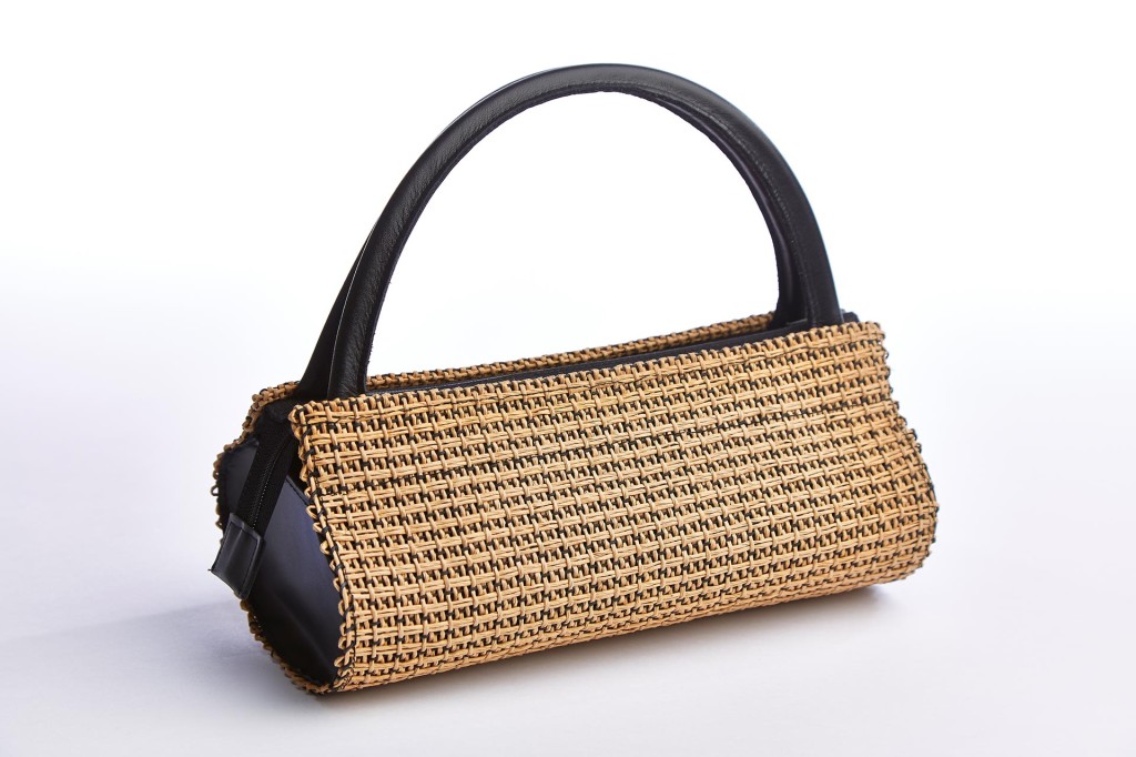 Hand bag, paper yarn, leather, lining. Ca. 28 cm length. Ca. 250 euros
