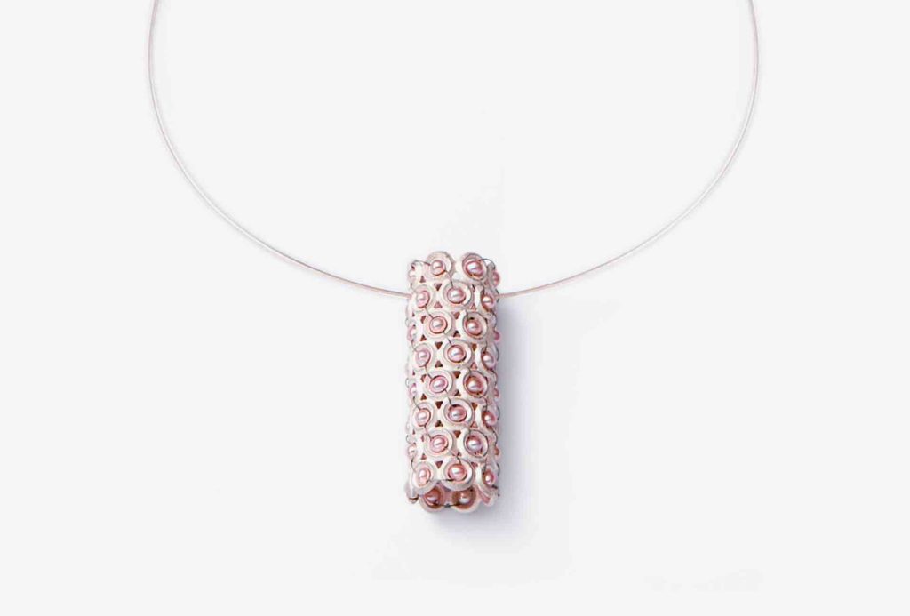 <em>Pearl row</em> pendant. 925 silver, freshwater pearl, stainless steel rope. 580 €.