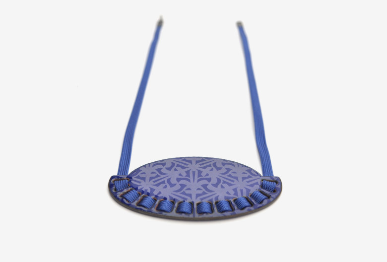 Necklace from the <em>mikromakro</em> collection. Enamel on copper, textile band and oxidized silver