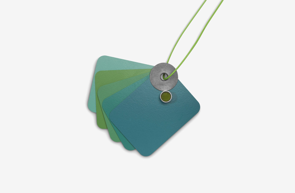 Pendant from the collection <em>laminati mille colori</em>. Composition blue-turquoise-green. Laminate, silver, felt