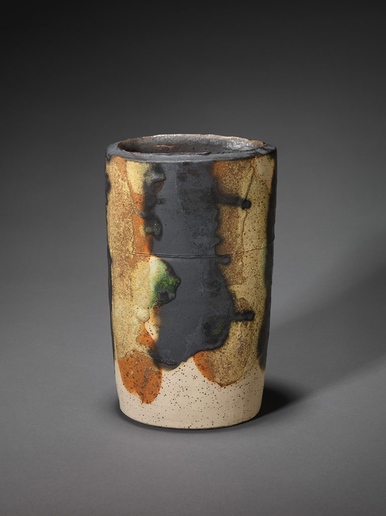 High cylinder shape on an oval base. Glaze: manganese ore, malachite, copper carbonate, ashes of apple tree and hawthorn, H 27.1, W 13.8, D 10.6 cm.