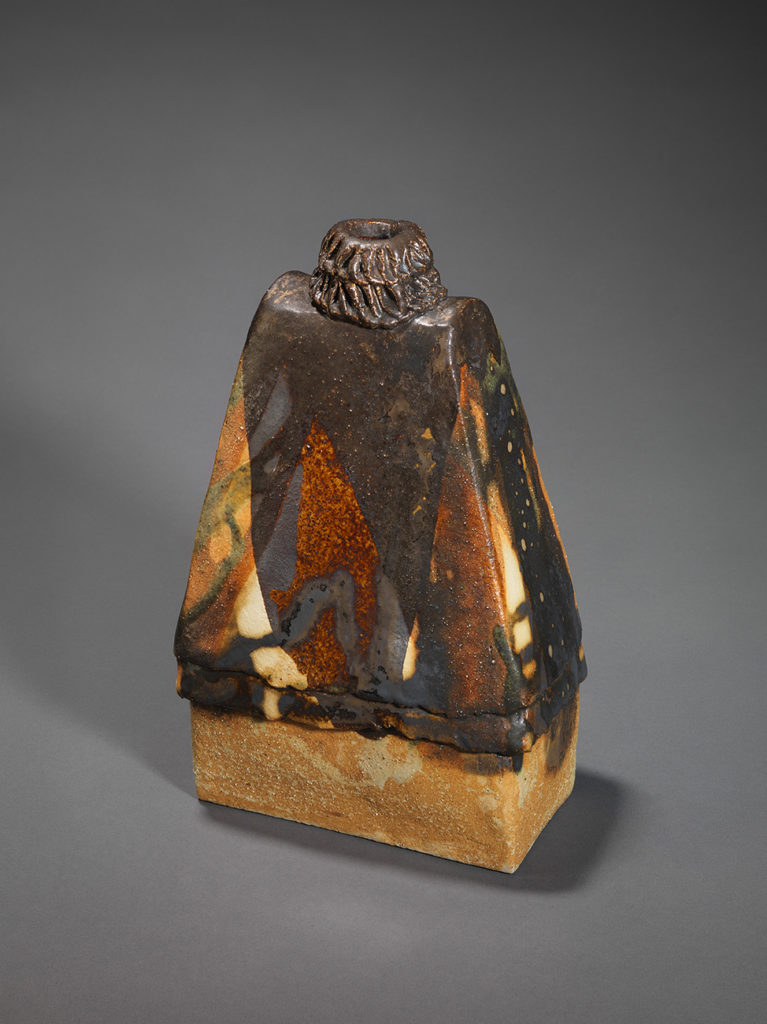 Square shape with double “ruff”. Glaze: manganese ore, copper carbonate, grapevine ash, H 25.6, W 15.7, D 10.2 cm.
