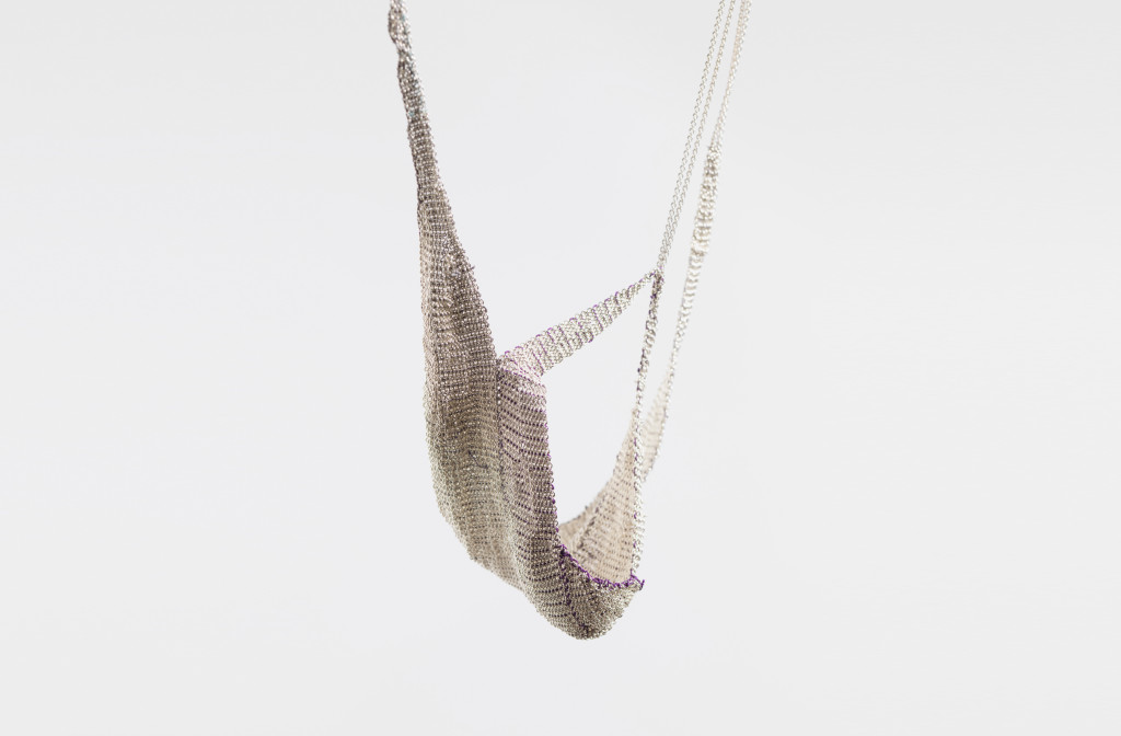 <em>Bat</em> necklace, 2012. Silver, silk tread. Photo Dries Van den Brande.