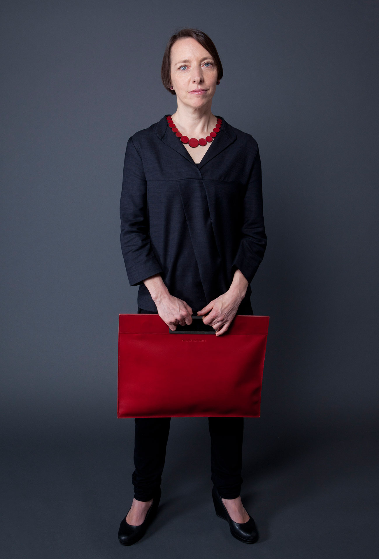 Monika Assem with bag and necklace