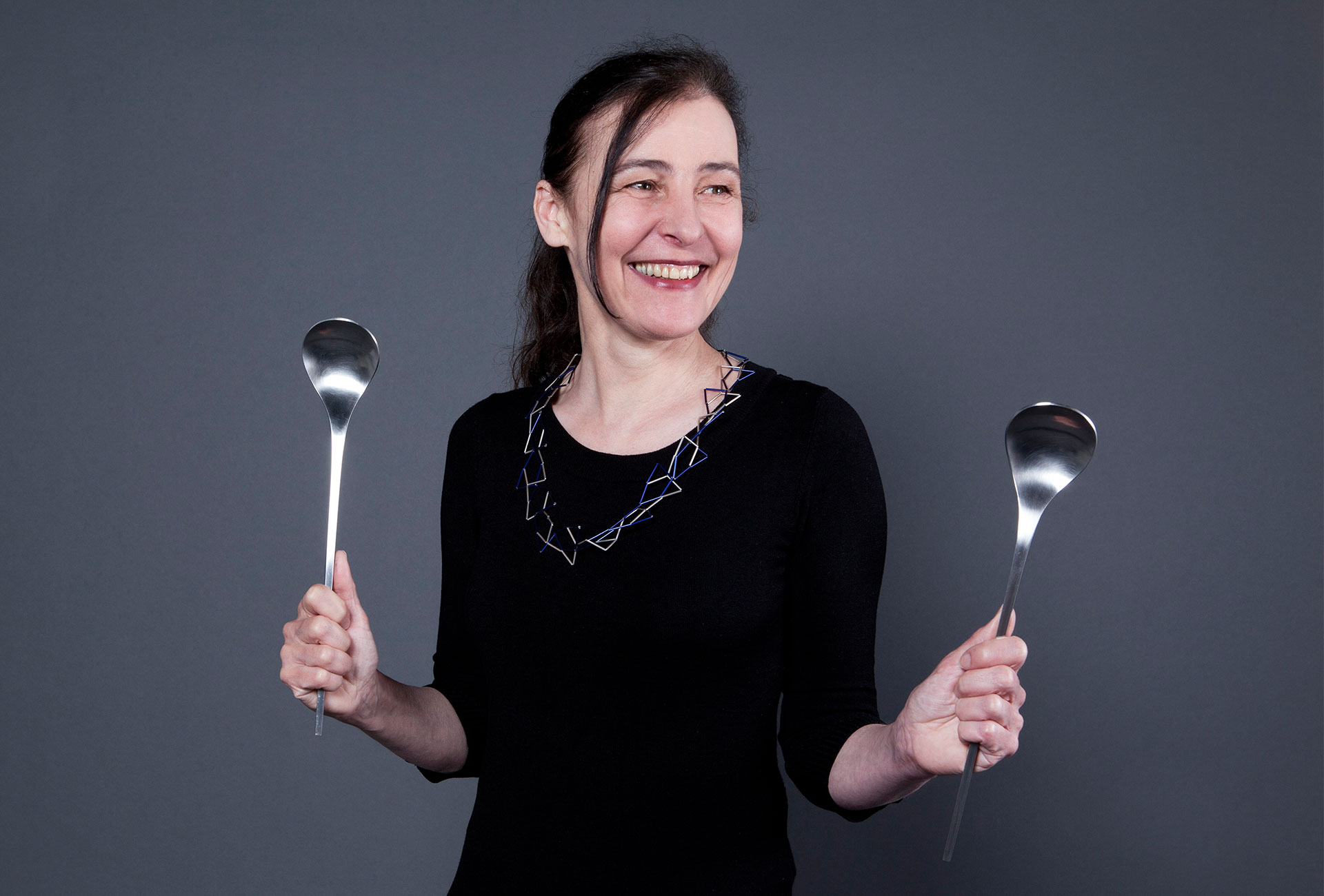 Friederike Maltz with necklace and salad servers