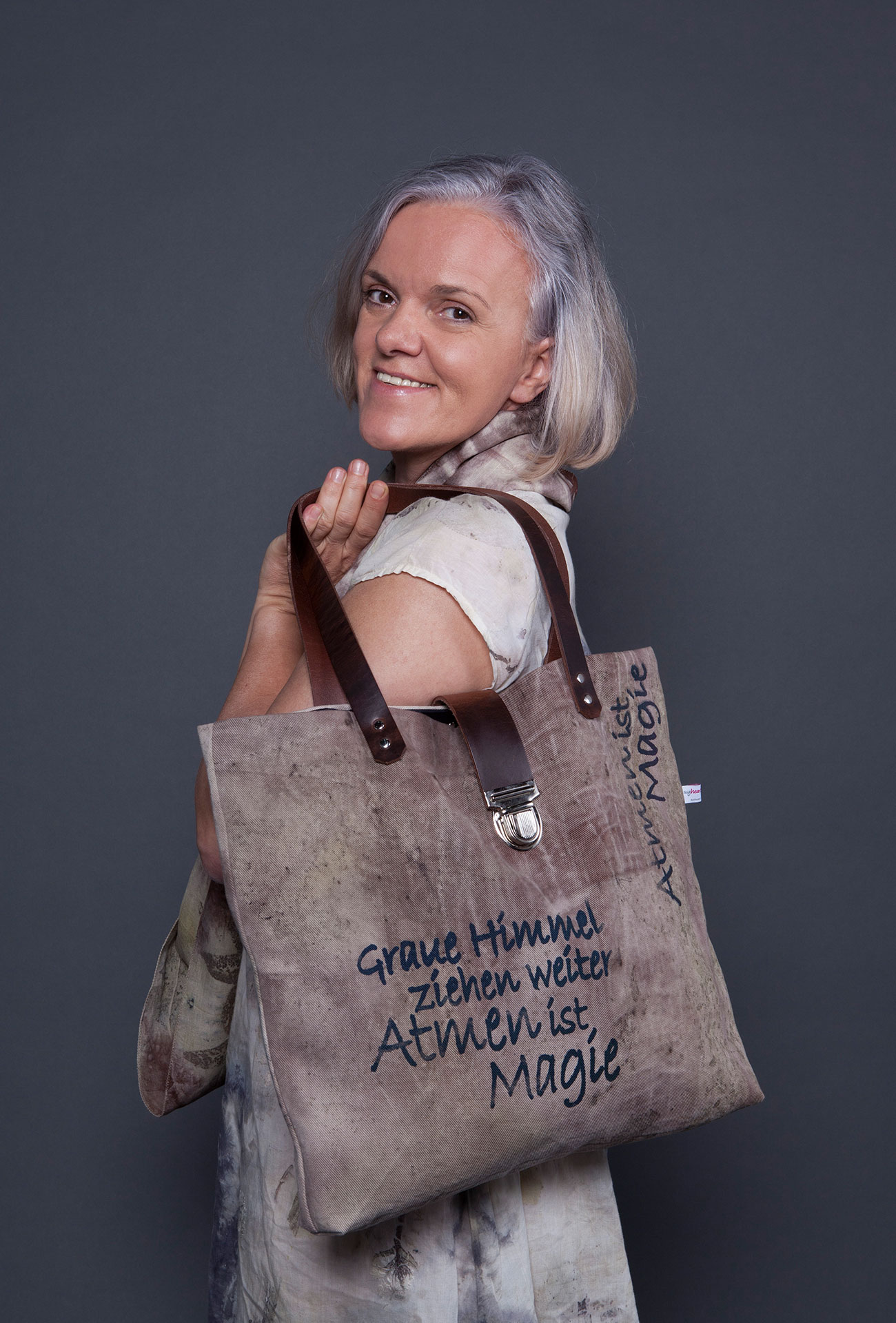 Sabine Kilb with scarf and shopper bag