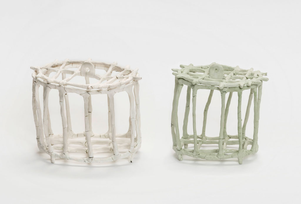 Grid vessels, 2017. Porcelain on metal, 17x14x15 cm and 13 x10x12 cm. Photo Frank Kleinbach.