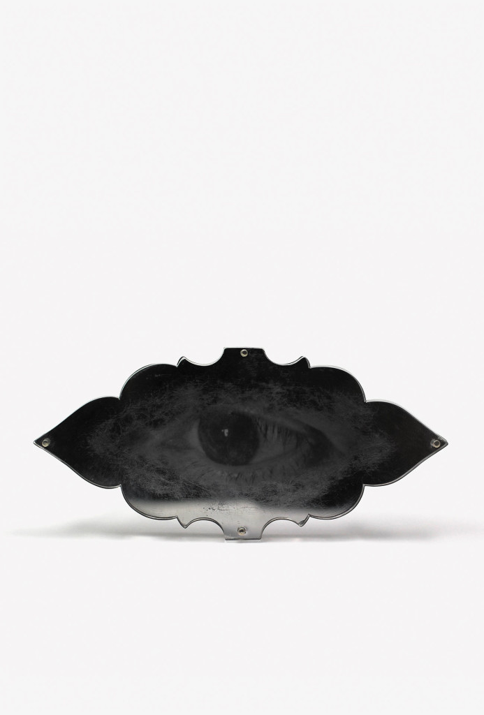 Lori Talcott, <em>Synecdoch</em> brooch, 2014. Oxidised silver, mirror, gelatin silver print, 3, 8 × 11 × 1 cm