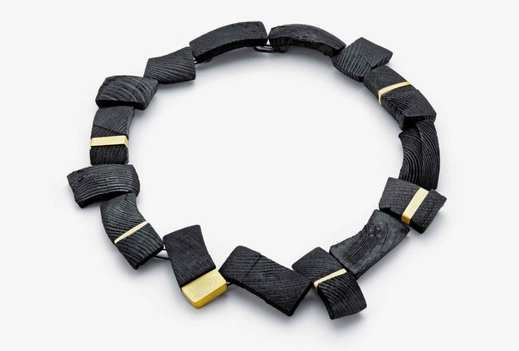 Necklace. Charcoal, 750 gold.