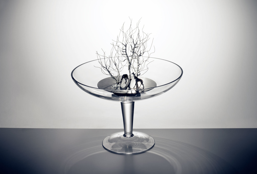 <em>Entdeckung</em> object. Glass, stainless steel, wire, mirror stones, faceted crystal glass stones, miniature figures. H 42 cm x ø 36 cm