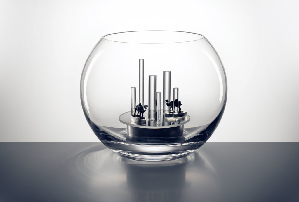<em>Klarheit und Tiefe</em> object. Glass, mirror, glass sticks, stainless steel, faceted crystal glass stones, miniature figures. H 18 cm x ø 23 cm