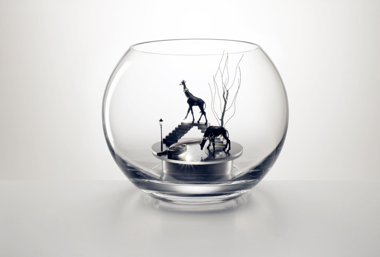 <em>Neuland</em> object. Glass, stainless steel, wire, faceted crystal glass stones, miniature lantern, miniature figures. H 12 cm ø 23 cm