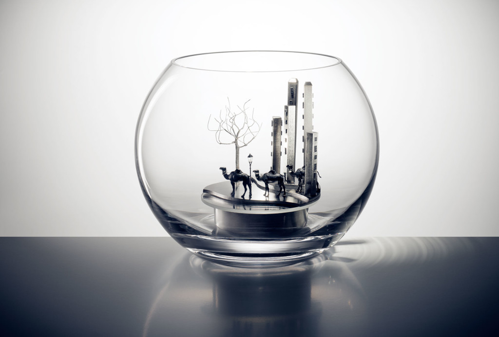 <em>Weltenbummler</em> object. Glass, stainless steel, mirror, wire, miniature lantern, miniature figures. H 18 cm x ø 23 cm