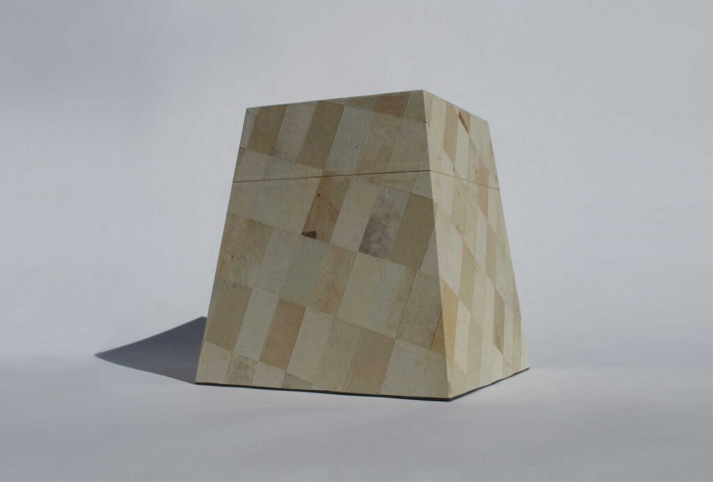 <em>Pyramid</em> urn. Handmade, used papers.