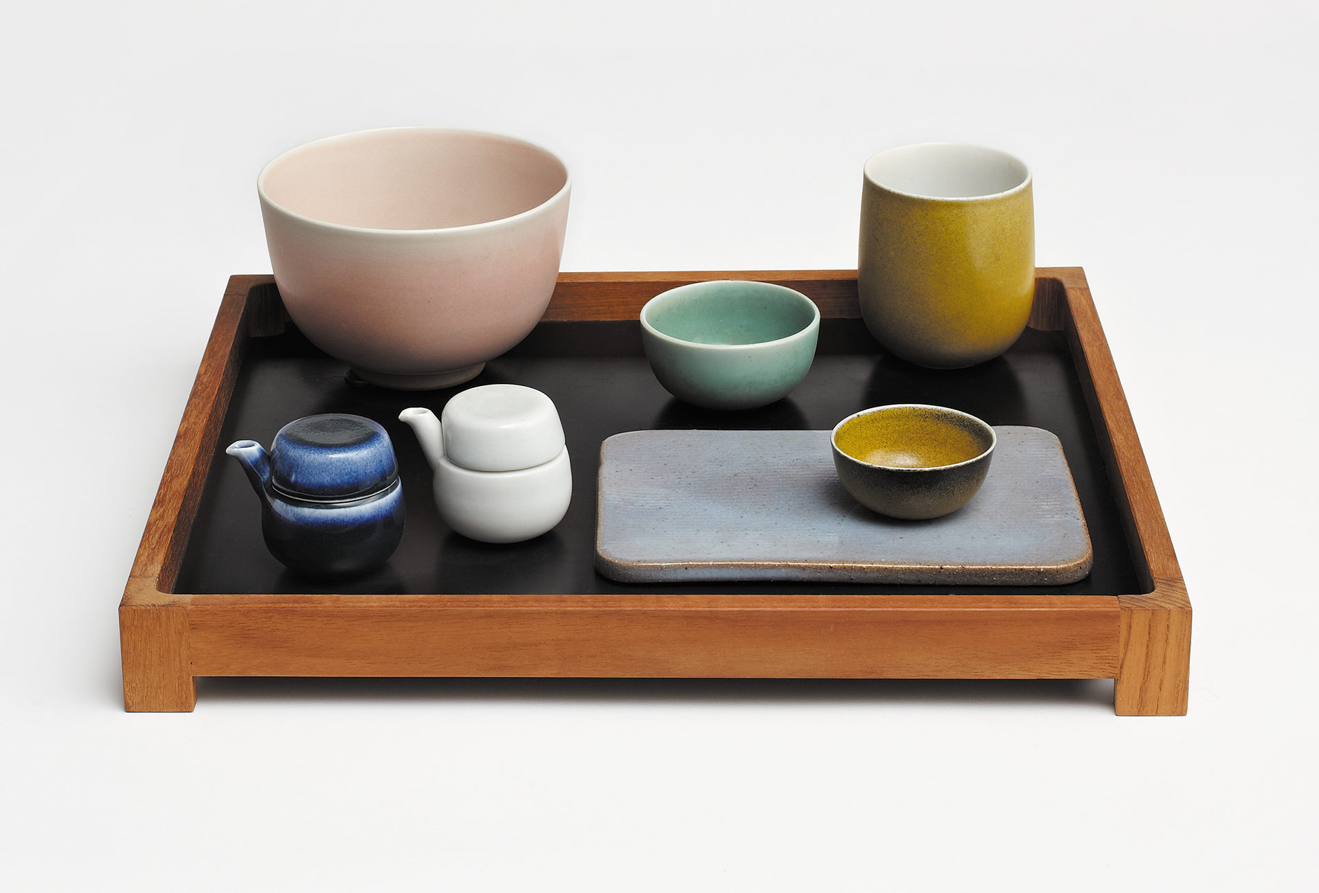 Tray with vessels by Snorre Stephensen, 1984. Teak, formica, porcelain
