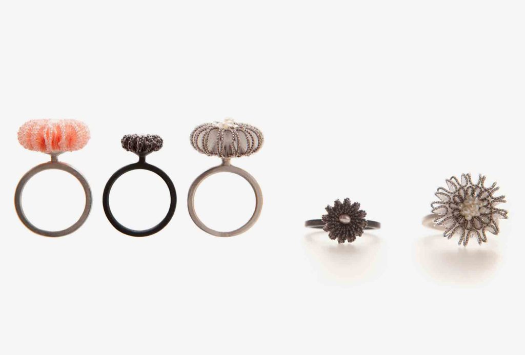 <em>Linea</em> rings medium and small. Silver 925, sweet water beads, nylon, rayon. © Anke Hennig Jewellery