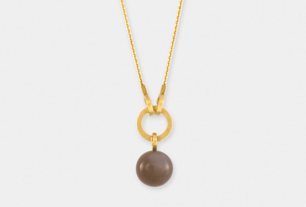 <em>Mondstein</em> [moonstone] necklace from the collection <em>Circle Line</em>. Gold 750, moonstone.