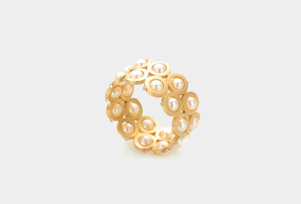 <em>Pile de Perles</em> ring from the collection <em>Cueilleurs de Perles</em>. Gold 750, Akoya pearls.
