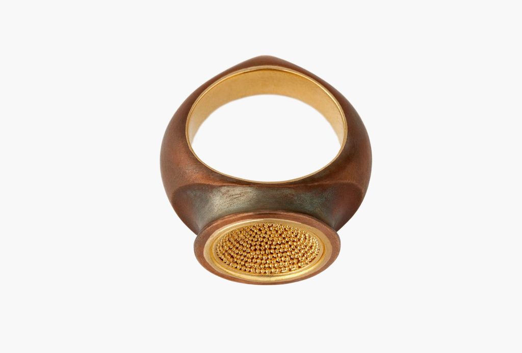 Granulated ring. Recycled gold 900 and burnished bronze.