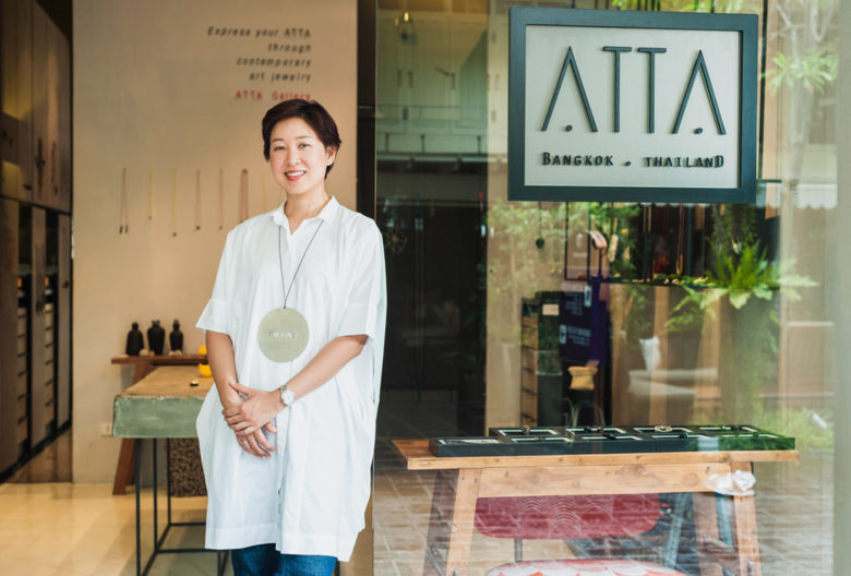 The Thai gallery owner Atinuj Tantivit enthusiastically wears contemporary jewelry.