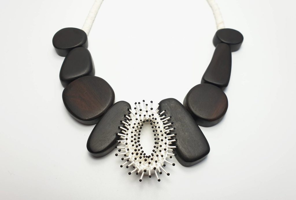 Necklace from the series <em>Blumentiere</em> [Flower Animals]. Silver, enamel, ebony.