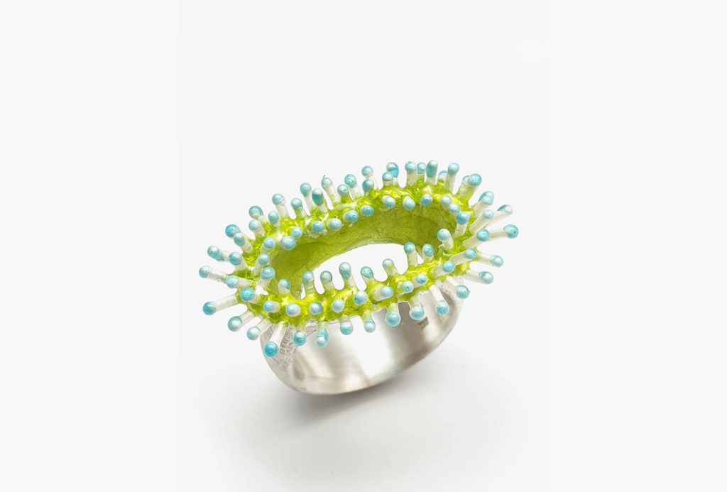 Ring from the series <em>Blumentiere</em> [Flower Animals]. Silver blue and yellow enamel.