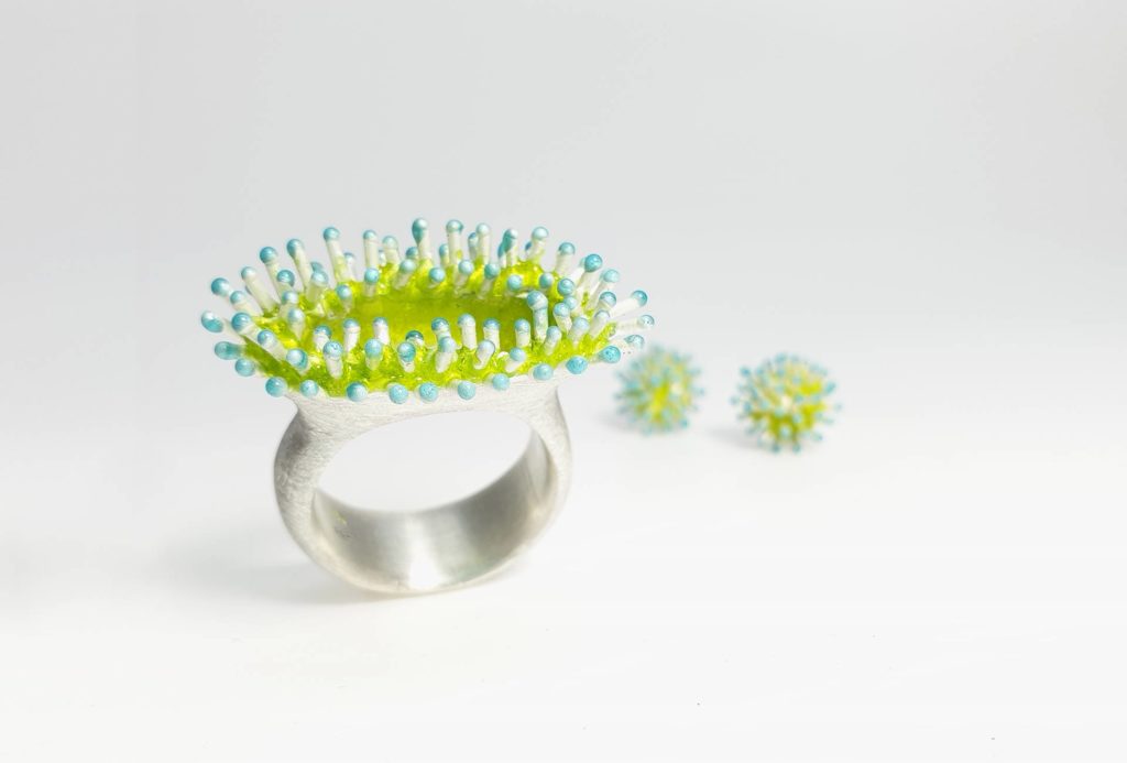 Ring and earrings from the series <em>Blumentiere</em> [Flower Animals], silver, yellow-blue enamel.