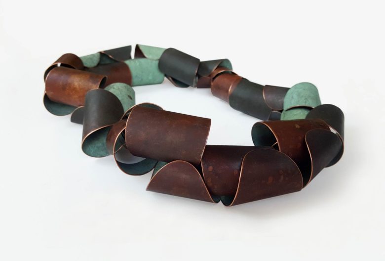 Necklaces made of galvanized steel and historical copper sheets with natural patina. Photo Henry M. Linder.
