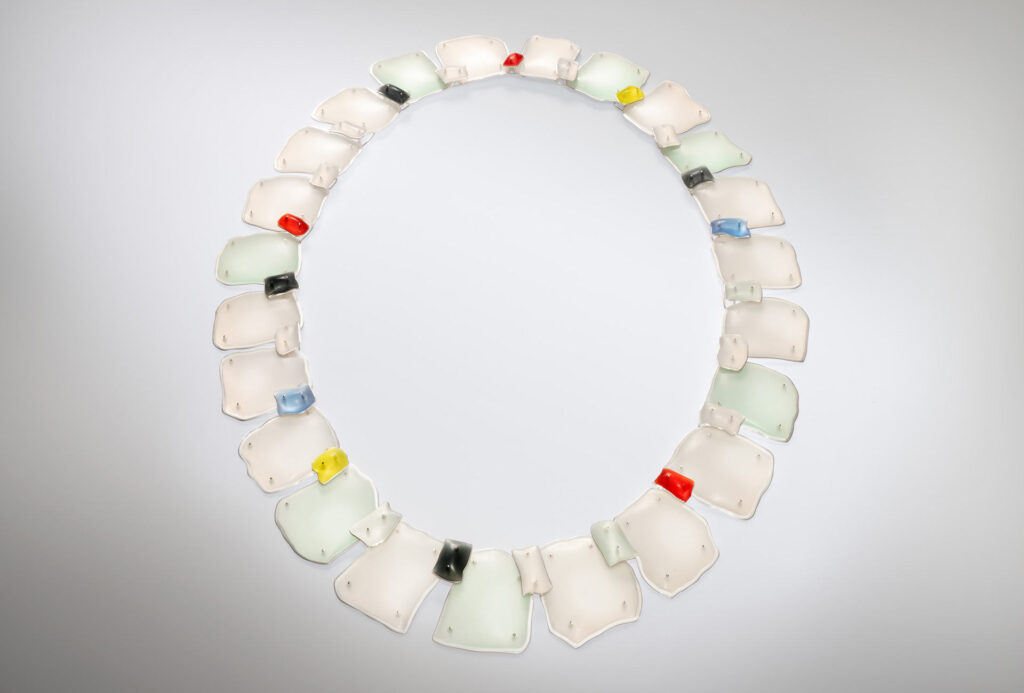 A snow-covered meadow. The winter sun reflects on snow and ice. The year’s last fruits hang from bare branches. An occasional patch of blue sky. Sledding weather.