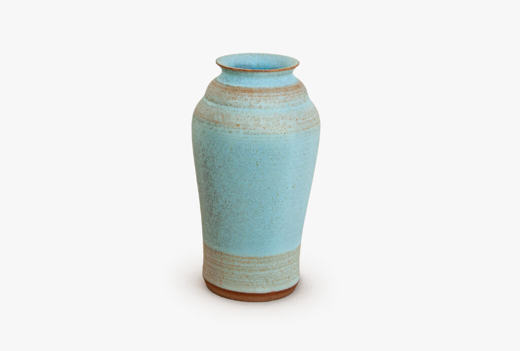 Vase <em>Fischform 2</em>, 2021. Stoneware clay, Spanish ochre, bright, matte, turquoise blue glaze, H 14.4 cm.